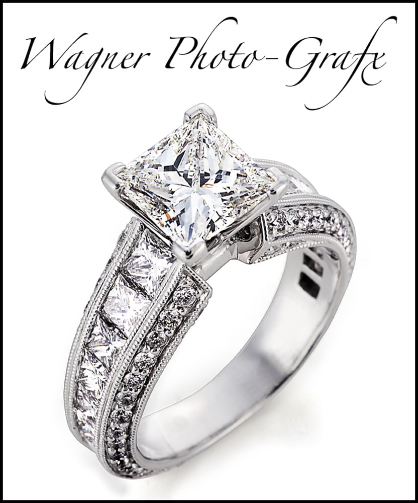 Ornate marquis diamond ring on white with Wagner Photo-Grafx logo above Product Photography