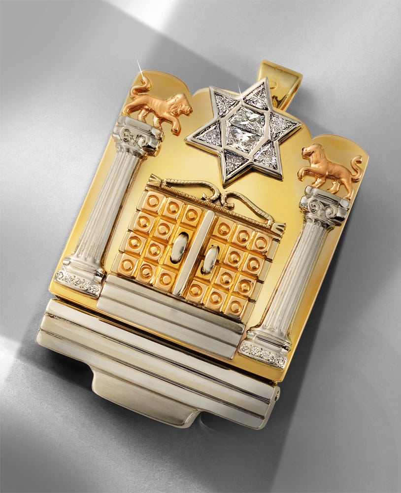 Flip open gold synagogue box pendant outside view featuring ornate doors flanked by silver pillars and a star of David with embedded diamonds Product Photography