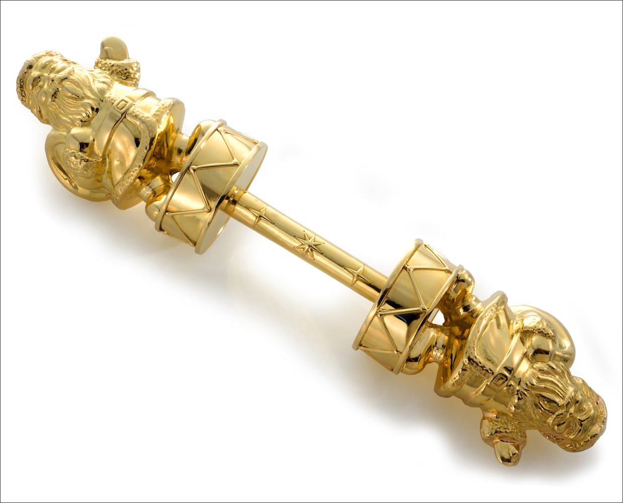 large gold baby rattle with santa clause sculptures on either end