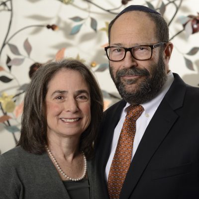 WPG.People.64 Rabbi and wife portrait in front of decorative artwork